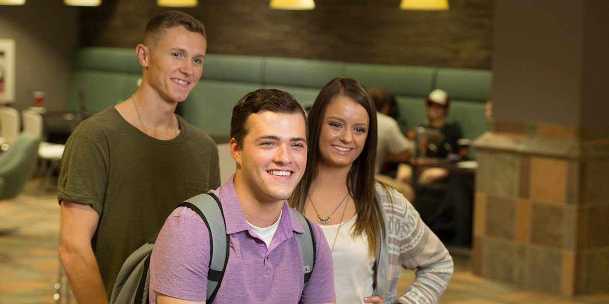 Three students in the Morris University Center at SIUE.