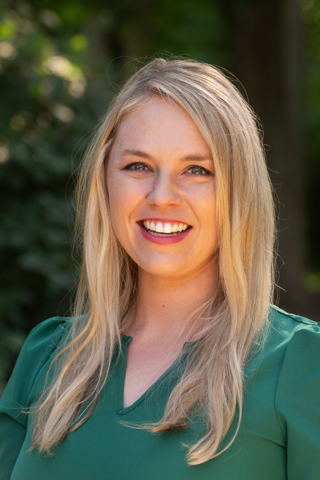 A portrait photo of Alisha Abbott