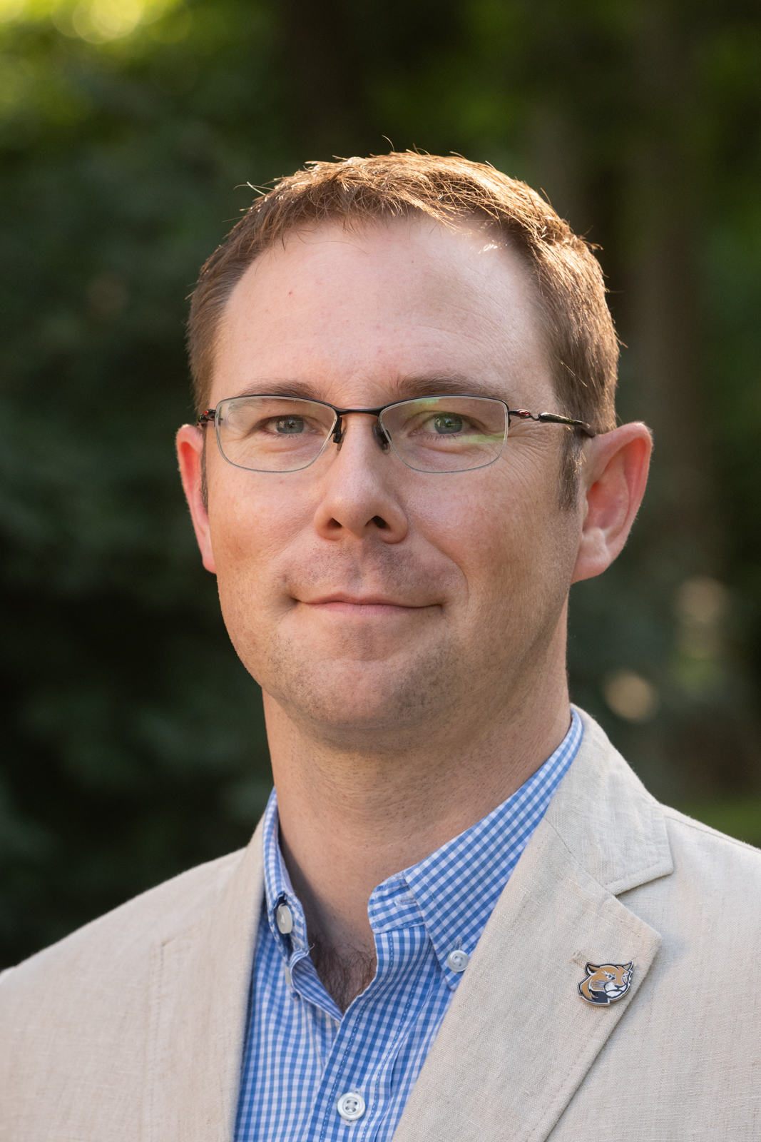 A portrait photo of Dr. Andrew Ravanelli