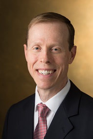 A portrait photo of Dr. Paul Rose